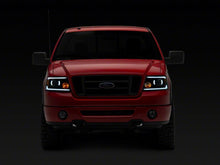 Load image into Gallery viewer, Raxiom 04-08 Ford F-150 Axial Series Projector Headlights w/ SEQL LED Bar- Blk Housing (Clear Lens) Headlights Raxiom
