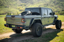 Load image into Gallery viewer, DV8 Offroad 2020+ Jeep Gladiator JT Adjustable In-Bed Tire Carrier
