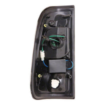 Load image into Gallery viewer, Raxiom 97-03 Ford F-150 Styleside LED Tail Lights- Black Housing- Red/Clear Lens | T542844
