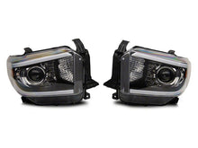 Load image into Gallery viewer, Raxiom 14-21 Toyota Tundra Axial Series Projector Headlights w/ LED Bar- Blk Housing (Clear Lens) Headlights Raxiom
