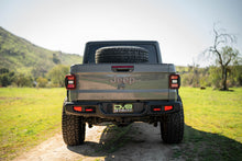 Load image into Gallery viewer, DV8 Offroad 2020+ Jeep Gladiator JT Adjustable In-Bed Tire Carrier
