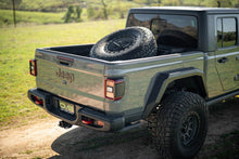 Load image into Gallery viewer, DV8 Offroad 2020+ Jeep Gladiator JT Adjustable In-Bed Tire Carrier
