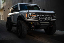 Load image into Gallery viewer, DV8 Offroad 7in Halo Elite Round Light w/ Accent Halo - White/Amber
