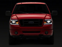 Load image into Gallery viewer, Raxiom 04-08 Ford F-150 Axial Series Projector Headlights with LED Bar- Black Housing- Clear Lens | T566363
