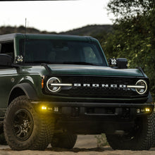 Load image into Gallery viewer, Baja Designs 21-22 Ford Bronco w/Steel Bumper S2 SAE Sportsmen Fog Pocket Light Kit - Amber Light Bars &amp; Cubes Baja Designs
