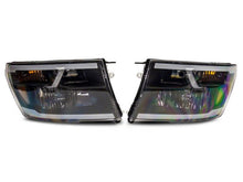 Load image into Gallery viewer, Raxiom 09-18 Dodge RAM 1500/2500/3500 Axial Headlights w/ SEQL LED Bar- Blk Housing (Clear Lens) Headlights Raxiom
