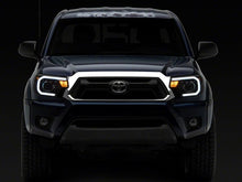Load image into Gallery viewer, Raxiom 12-15 Toyota Tacoma Axial Series Projector Headlights w/ LED Bar- Blk Housing (Clear Lens) Headlights Raxiom
