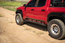 Load image into Gallery viewer, DV8 Offroad 24-25 Toyota Tacoma Double Cab Rock Sliders
