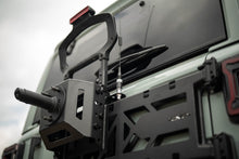 Load image into Gallery viewer, DV8 Offroad 18-25 Jeep Wrangler JL Spare Tire Carrier
