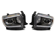 Load image into Gallery viewer, Raxiom 14-21 Toyota Tundra Axial Series Projector Headlights w/ LED Bar- Blk Housing (Clear Lens) Headlights Raxiom
