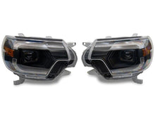 Load image into Gallery viewer, Raxiom 12-15 Toyota Tacoma Axial Series Switchback Projector Headlights- Black Housing- Clear Lens | TT23359
