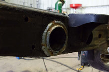 Load image into Gallery viewer, Rustbuster 11-18 Chevy Silverado 2500HD/3500HD Forward Spare Tire Crossmember
