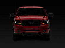 Load image into Gallery viewer, Raxiom 04-08 Ford F-150 Axial Series Projector Headlights- Black Housing- Clear Lens | T569352
