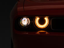 Load image into Gallery viewer, Raxiom 08-14 Dodge Challenger Halo Projctr Headlights w/Sequential Turn Signals-Blk Hsng(Clear Lens) Headlights Raxiom
