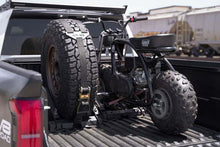 Load image into Gallery viewer, DV8 Offroad Truck Bed Universal Tire Carrier &amp; Accessory Mount
