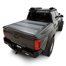 Load image into Gallery viewer, Westin 2024 Toyota Tacoma 2WD/4WD 5ft. Bed Hard Tri-Fold Tonneau Cover - Black Westin
