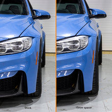 Load image into Gallery viewer, Mishimoto Wheel Spacers - 5x120 - 72.6 - 20 - M14 - Black Mishimoto
