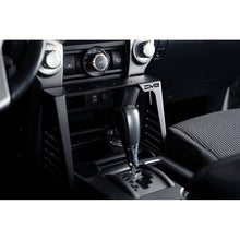 Load image into Gallery viewer, DV8 Offroad 10-23 Toyota 4Runner Center Console Molle Panels &amp; Device Mount
