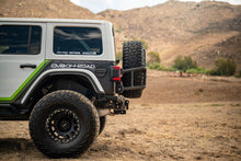 Load image into Gallery viewer, DV8 18-25 Jeep Wrangler JL Body Mounted Tire Carrier
