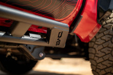Load image into Gallery viewer, DV8 Offroad 24-25 Toyota Tacoma Double Cab Rock Sliders
