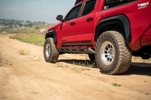 Load image into Gallery viewer, DV8 Offroad 24-25 Toyota Tacoma Double Cab Rock Sliders
