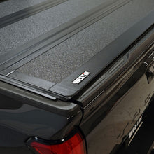 Load image into Gallery viewer, Westin 2024 Toyota Tacoma 2WD/4WD 5ft. Bed Hard Tri-Fold Tonneau Cover - Black Westin
