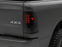 Load image into Gallery viewer, Raxiom 09-18 Dodge RAM 1500/2500/3500 Axial Series LED Tail Lights- BlkHousing- SmokedLens Tail Lights Raxiom
