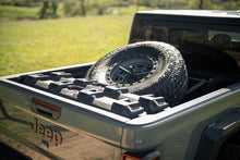 Load image into Gallery viewer, DV8 Offroad 2020+ Jeep Gladiator JT Adjustable In-Bed Tire Carrier
