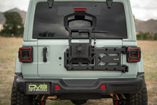 Load image into Gallery viewer, DV8 Offroad 18-25 Jeep Wrangler JL Spare Tire Carrier
