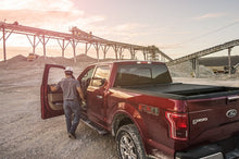 Load image into Gallery viewer, Roll-N-Lock 07-18 Toyota Tundra Crew Max Cab XSB 65in A-Series Retractable Tonneau Cover Tonneau Covers - Retractable Roll-N-Lock   
