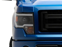 Load image into Gallery viewer, Raxiom 09-14 Ford F-150 Axial Series Projector Headlights w/ LED Light Bar- Blk Housing (Clear Lens) Headlights Raxiom
