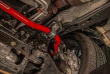 Load image into Gallery viewer, UMI Performance 21-24 Ford F-150 1 3/8in Solid Front Sway Bar - Red
