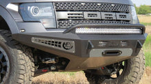 Load image into Gallery viewer, Addictive Desert Designs ADDF017275050103 Addictive Desert Designs 10-14 Ford F-150 Raptor HoneyBadger Front Bumper w/ Winch Mount
