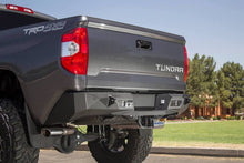 Load image into Gallery viewer, Addictive Desert Designs ADDR741231280103 Addictive Desert Designs 2014+ Toyota Tundra Stealth Fighter Rear Bumper w/ Backup Sensor Cutouts
