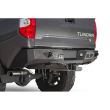 Load image into Gallery viewer, Addictive Desert Designs Bumpers - Steel Addictive Desert Designs 2014+ Toyota Tundra Stealth Fighter Rear Bumper w/ Backup Sensor Cutouts
