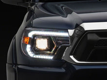 Load image into Gallery viewer, Raxiom 12-15 Toyota Tacoma Axial Series Switchback Projector Headlights- Chrome- Clear Lens | TT23360
