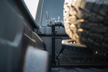 Load image into Gallery viewer, DV8 Offroad 2020+ Jeep Gladiator JT Adjustable In-Bed Tire Carrier
