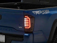 Load image into Gallery viewer, Raxiom 16-23 Toyota Tacoma LDS Series LED Tail Lights- Black Housing- Smoked Lens | TT67690
