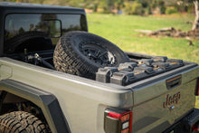 Load image into Gallery viewer, DV8 Offroad 2020+ Jeep Gladiator JT Adjustable In-Bed Tire Carrier
