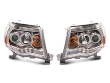 Load image into Gallery viewer, Raxiom 05-09 Toyota Tacoma Super White LED Halo Projector Headlights- Chrome Housing- Clear Lens | TT5933
