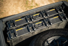 Load image into Gallery viewer, DV8 Offroad 2020+ Jeep Gladiator JT Adjustable In-Bed Tire Carrier
