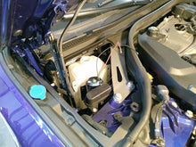Load image into Gallery viewer, BMW F9x M5 M8 water methanol injection kit installed under hood in engine bay of purple car
