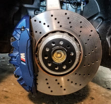 Load image into Gallery viewer, BMW G chassis wheel spacers installed on drilled brake rotor with blue BMW M brake caliper
