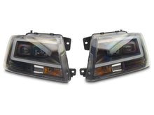 Load image into Gallery viewer, Raxiom 04-08 Ford F-150 Axial Series Projector Headlights- Black Housing- Clear Lens | T569352
