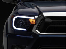 Load image into Gallery viewer, Raxiom 12-15 Toyota Tacoma Axial Series Headlights/Seq LED Bar- Black- Clear Lens | TT21848
