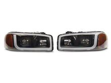 Load image into Gallery viewer, Raxiom 99-06 GMC Sierra 1500 Axial Series Headlights w/ LED Bar- Blk Housing (Clear Lens) Headlights Raxiom
