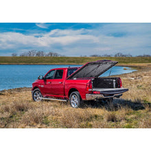 Load image into Gallery viewer, Undercover 2025 Ram 1500 5ft 7in Short Bed Elite LX Bed Cover - PXJ - Diamond Black Crystal Pearl
