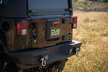 Load image into Gallery viewer, DV8 Offroad 07-18 Jeep Wrangler JK Spare Tire Delete
