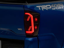 Load image into Gallery viewer, Raxiom 16-23 Toyota Tacoma LED Tail Lights- Black Housing- Clear Lens | TT15696
