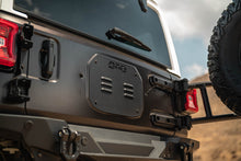 Load image into Gallery viewer, DV8 18-25 Jeep Wrangler JL Body Mounted Tire Carrier
